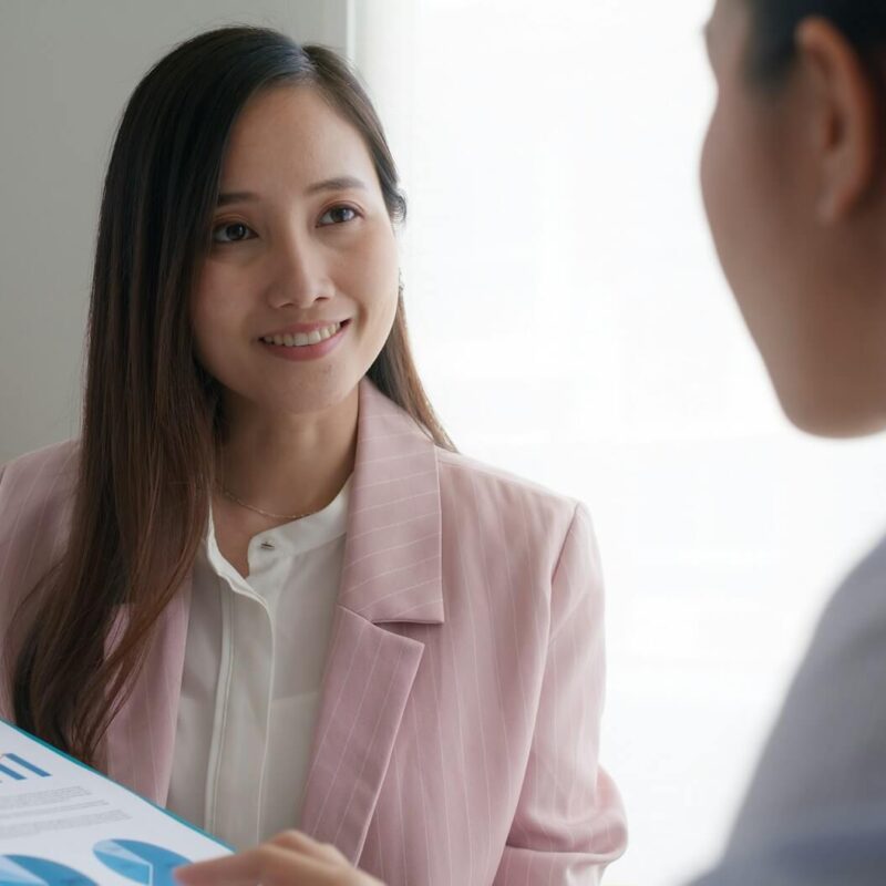 asia-woman-real-estate-sale-agent-or-trader-advice-sitting-at-lawyer-office-desk.jpg